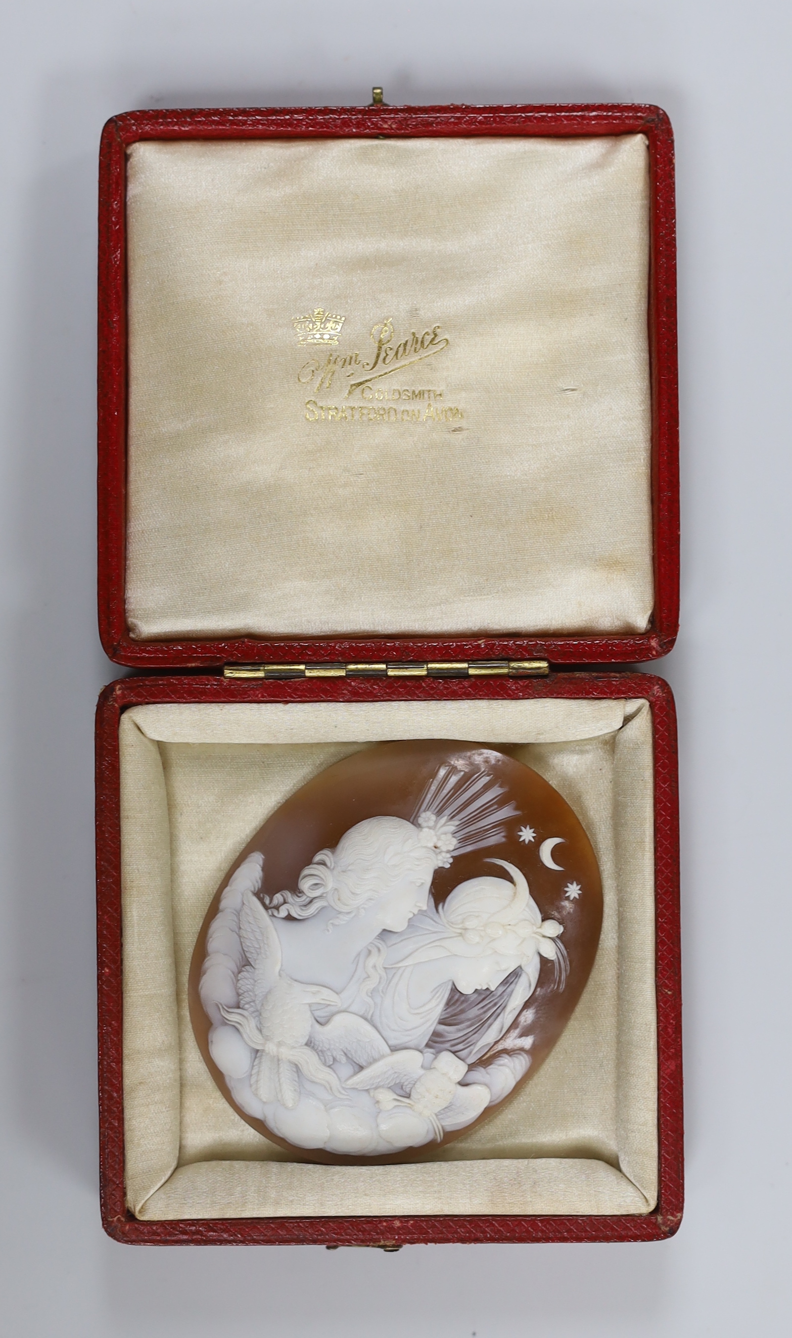 An unmounted Victorian cameo shell, carved with Selene and Diana, 61mm.